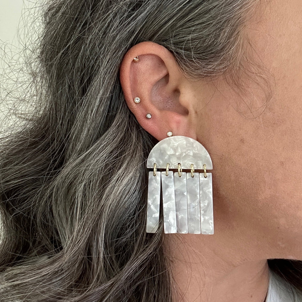 woman wearing close up of acrylic Fringe Earrings in white