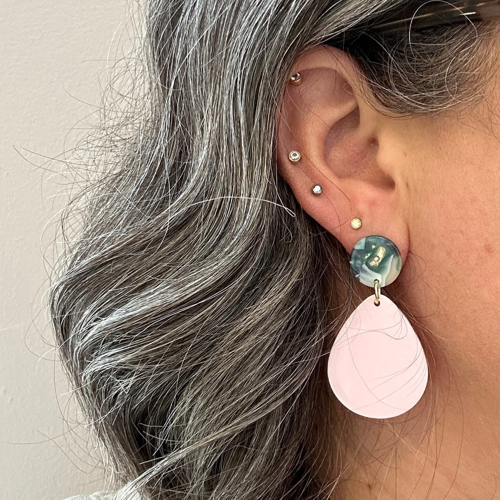 women wearing  mini acrylic teardrop earring in pink and green and cream 