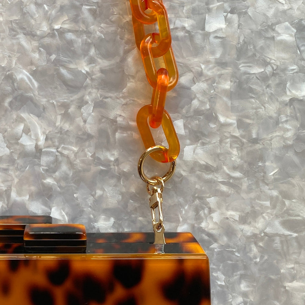 Acrylic Purse Strap in Blaze orange_close up clasp