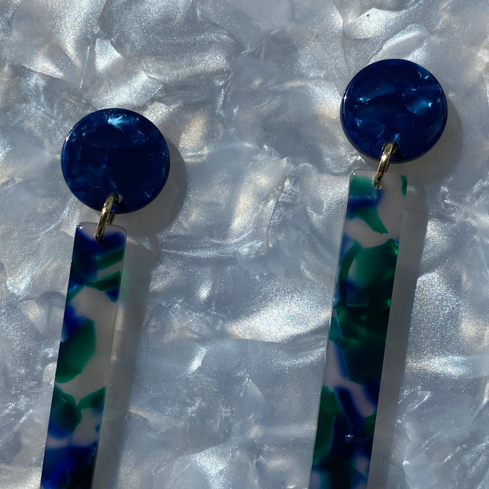 close up of acrylic Matchstick Drop Earrings in Blue and Green