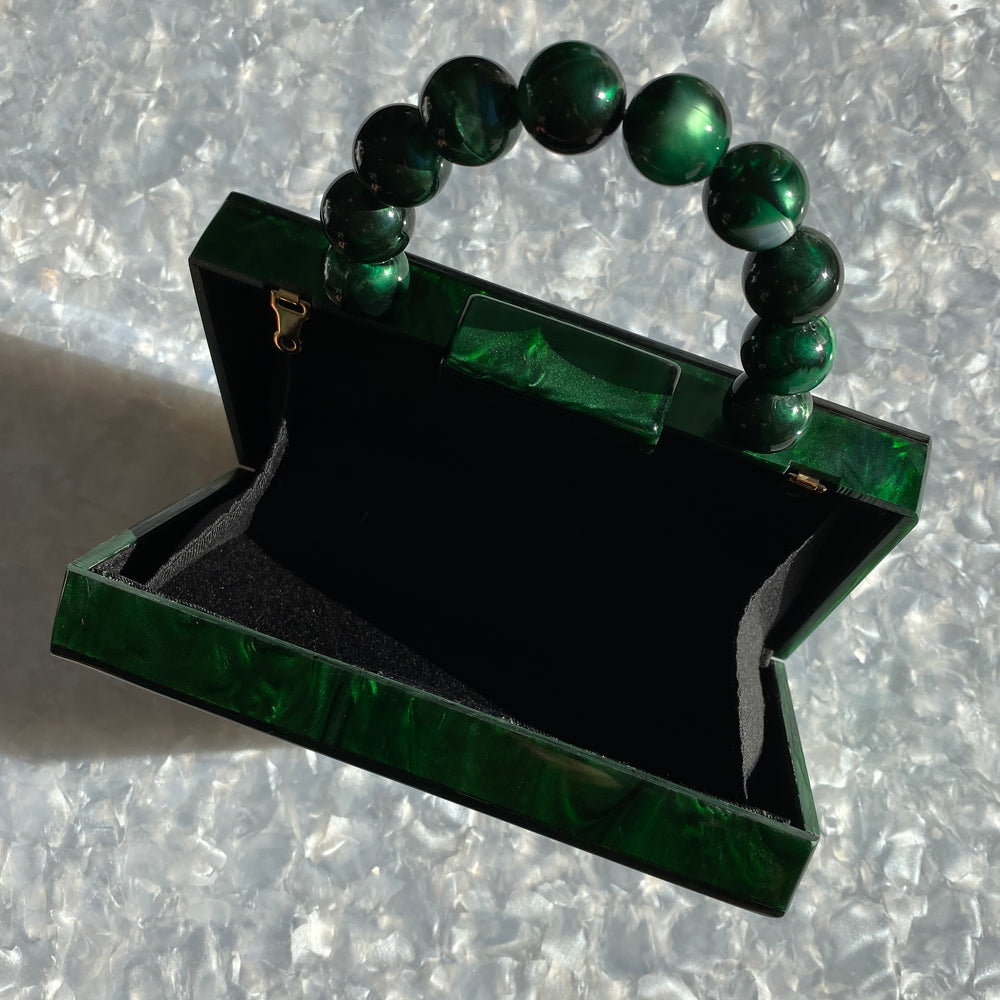 clutch purse with beaded handle in emerald green acrylic_interior