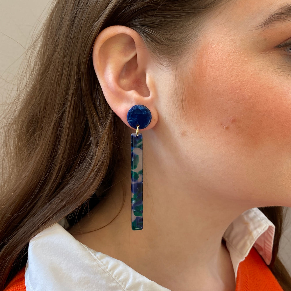 woman wearing acrylic Matchstick Drop Earrings in Blue and Green