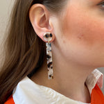 woman wearing acrylic Matchstick Drop Earrings in Pearly Tortoise