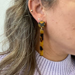 woman wearing acrylic Matchstick Drop Earrings in Tortoise