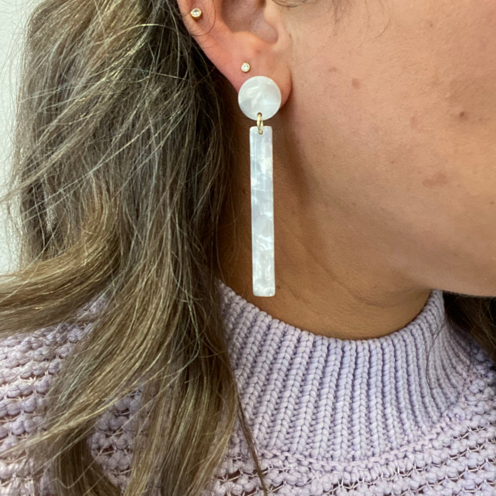 woman wearing acrylic Matchstick Drop Earrings in White