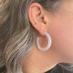 women wearing Acrylic Hoop Earrings in white 